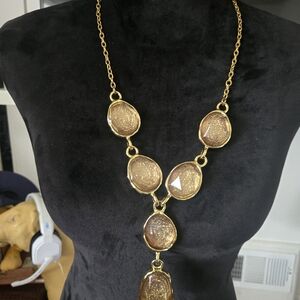 A Vintage Y-shape drop design with organic, pebble-like stations.Taste Of Honey